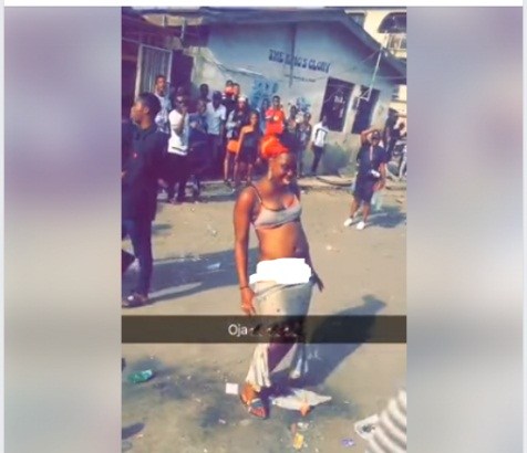 Lady strips off in the middle of a road in Lagos (photos) 17