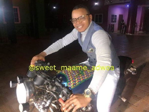 Obinim rides a motorbike after gifting 14 cars in his church 5