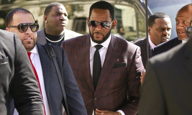 R Kelly charged with prostitution and solicitation involving girl under 18 17