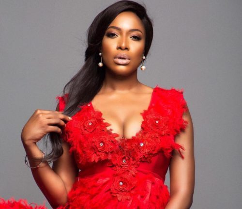 Chika Ike Removes Her Pant As She Takes Photos In Black Dinner Dress 25