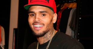 Chris Brown shares topless photo of his baby mama and their son