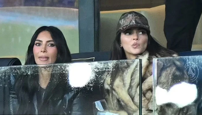 Kim Kardashian and Kendell Jenner make a rare sighting at a football game in Paris 28
