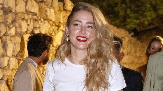Amber Heard spotted with crutches in Madrid ahead of her training injury for the NYC marathon 8