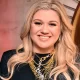Kelly Clarkson turns heads in figure-hugging leather look during latest star-studded episode of talk show 19