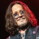 Johnny Depp Marks Return to Social Media With Smiling Photo 17