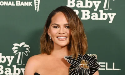 Chrissy Teigen looks like a real-life flower in shimmering dress with very unexpected detail 11