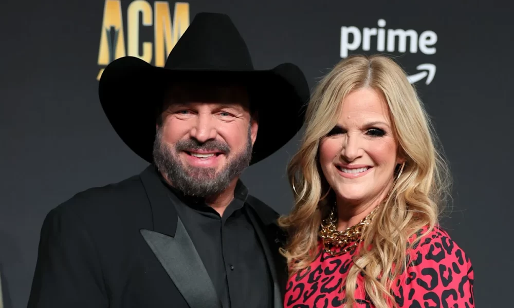 Garth Brooks' wife Trisha Yearwood displays incredible slimmed-down physique in mini dress and fishnet tights 71