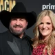 Garth Brooks' wife Trisha Yearwood displays incredible slimmed-down physique in mini dress and fishnet tights 73