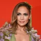 Jennifer Lopez Wore a Green Gown and Floor-Length Floral Cape to the Ellie Saab Couture Show 16
